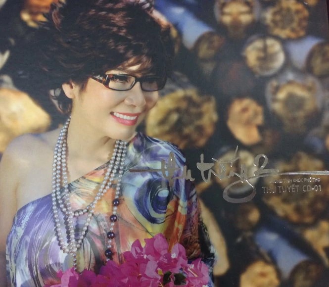 A person with a bouquet of flowersDescription automatically generated